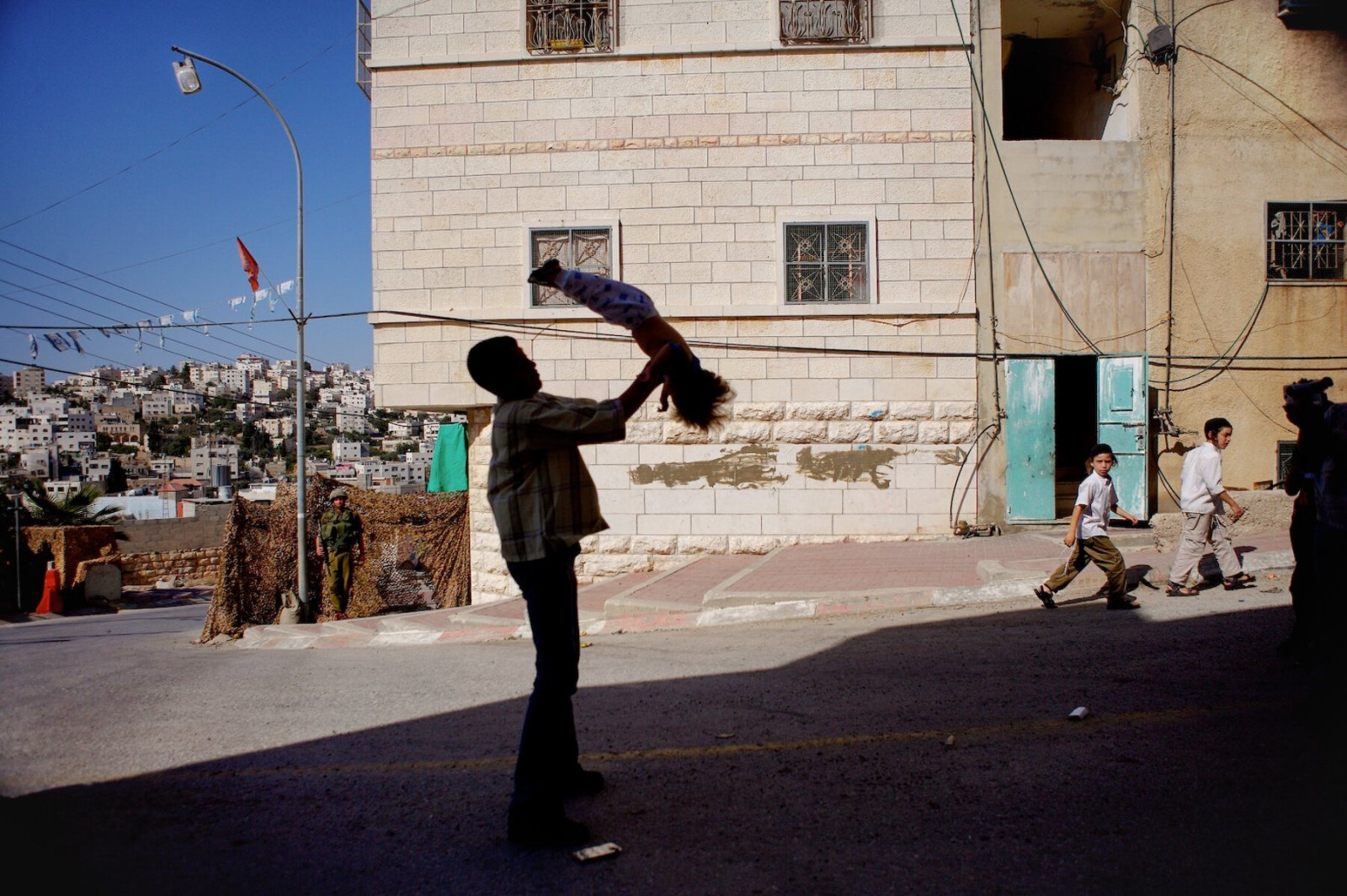<i>Palestinian Siblings</i>, Israeli Settler Children and IDF Soldiers, Hebron, West Bank, 2005